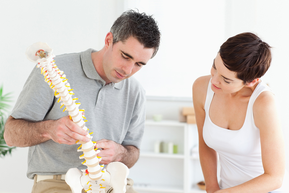 chiropractic care being explained to a patient